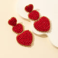 Red Crystal Bead Three Tier Heart Drop Earrings Gold-Tone Trim view 3