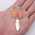 Long Pink Carrot Enamel Charm with Green Top and Gold Tone Edge view 1