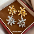 Sculpted Flower Stud Earrings in Gold and Silver Tones view 1