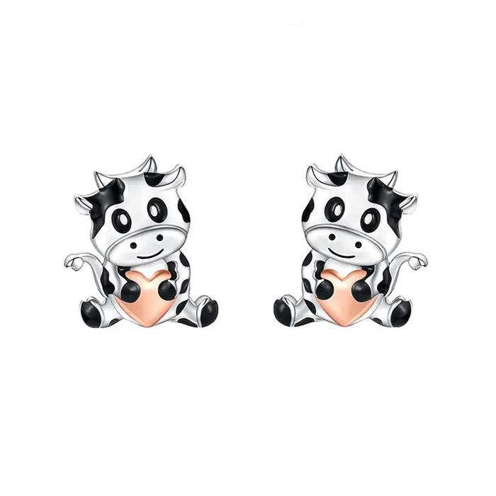 Black and White Cow Stud Earrings with Peach Accents