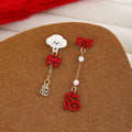 Mismatched Dog Bow and Blessing Long Stud Earrings view 3