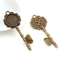 Ornate Key Shaped Round Cabochon Pendant Bezel Trays view 2