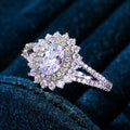Silver Tone Floral Cluster Split Shank Ring With Polished Clear Stone Detail view 2