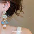 Blue Crystal Floral Drop Earrings in Polished Statement Design view 3