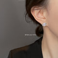 Silver Filigree Bow Purple CZ Center Stud Clip Earrings view 2