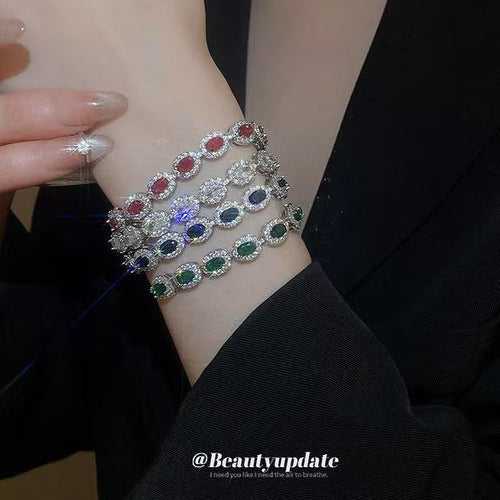 oval halo crystal slider bracelet in blue, clear, green, or pink shown in the first close product view