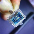 Blue Emerald Cut Halo Crystal Ring in Polished Metal view 3