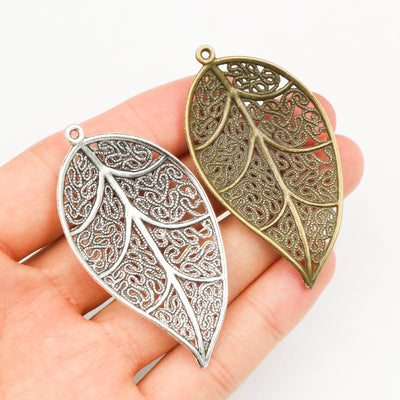 Filigree leaf pendants showing assorted shapes and finishes