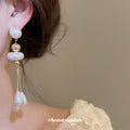 Gold Pearl Drop Earrings With Three White Teardrop Tassels view 4