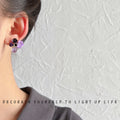 Gold Tone Purple Flower And Faceted Stone Cluster Stud Earrings view 2