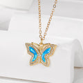 Gold Tone Blue Opal Effect Animal and Butterfly Pendant Necklaces view 3