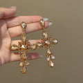 Crystal Cross Drop Stud Earrings in Silver or Champagne Gold Tone view 3