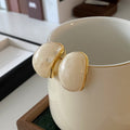 Gold Tone Oval Textured Stud Earrings in Three Colors view 3
