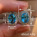 Oval Halo Stud Earrings In Blue, Green, And Aqua Centers view 5