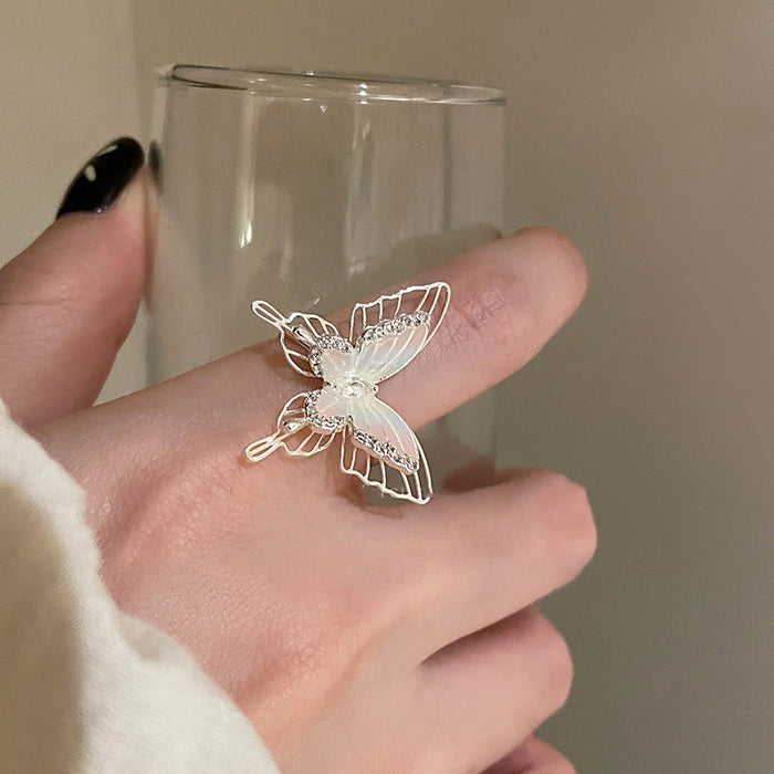 Two Silver Tone Butterfly Open Rings With Translucent Or Blue Crystal Wings