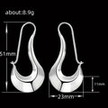 Sculptural Open Teardrop Long Hook Earrings In Two Metal Tones view 5