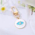 Gold Tone Enamel Lash and Crystal Evil Eye Clip Keychains view 6