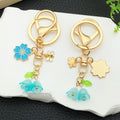Pink or White Blossom Bee and Butterfly Keychains with Metal Hardware view 2
