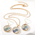 Round Pressed Blue Flower Resin Necklace and Earring Options view 4