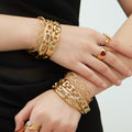 Hollow Link Clasp and Open Twist Bangles Gold Steel view 2