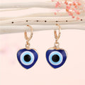 Gold Tone Heart-Shaped Blue Evil Eye Necklace and Huggie Earrings view 6