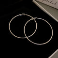 Minimal Thin Round Hoop Earrings in Gold and Silver view 8