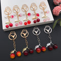 Twelve Resin Cherry Strawberry and Peach Metal Keychain Designs view 2