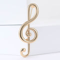 Polished Treble Clef Music Note Brooch Gold and Silver view 2