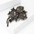 Antique Gold Tone Floral Brooch With Red Black and Clear Crystals view 2