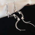 Gold Tone Butterfly and Vine Stud Earrings with Long Tassels view 6