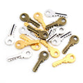Mini Key Shaped Metal Charms in Four Finish Options view 9