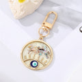 Gold Tone Irregular Openwork and Lash Evil Eye Clip Keychains view 4