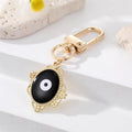 Gold Tone Filigree Oval Teardrop and Star Evil Eye Clip Keychains view 6