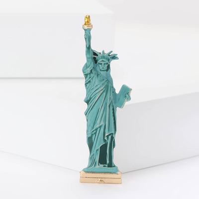 Front view of miniature Statue of Liberty figure