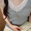 Silver Tone Crystal Cross and Star Pendant Necklace view 3