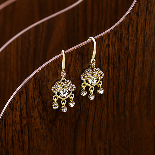 Pair hanging on curved wooden display