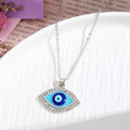 Gold and Silver Tone Crystal Evil Eye Pendant Necklaces in Eight Styles view 6