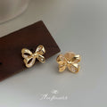 Gold Tone Clear Stone Ribbon Bow Earrings In Stud And Clip Styles view 6