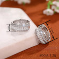 Silver Tone Crystal Pave Huggie Hoop Earrings Polished Metal Earrings view 4