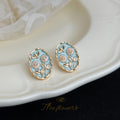 Gold Tone Pale Blue Enamel Flower And Leaf Oval Stud Earrings view 3