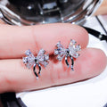 Silver Bow Clear Stone Stud Earrings White Gold Alloy view 1
