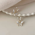 Gold Tone Pearlescent Double Butterfly Drop Stud Earrings view 4
