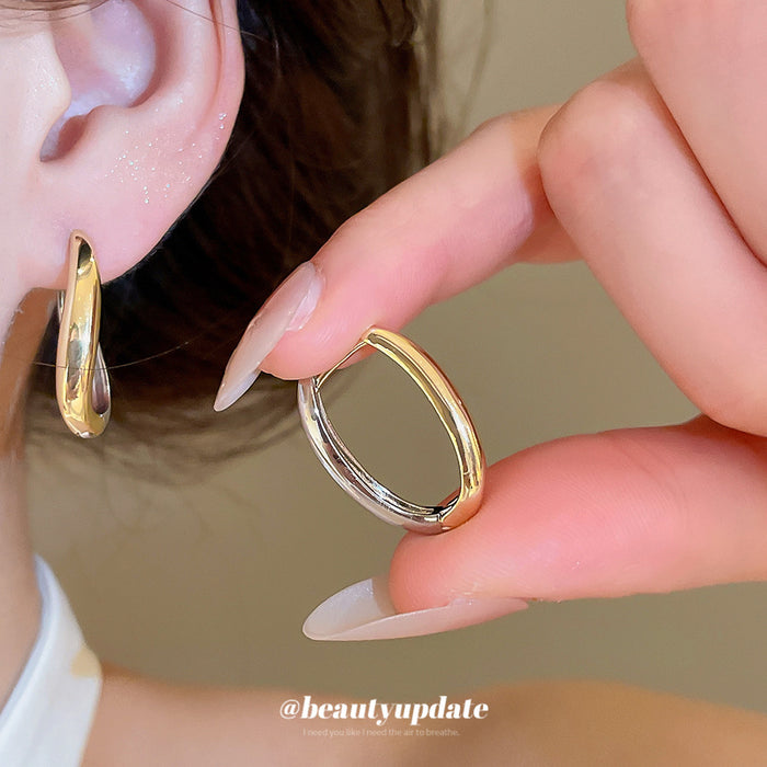 Polished Two Tone Rounded U Shaped Metal Hoop Earrings