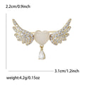 Winged Heart Metal Brooch with Crystal Wings Flanking a Heart with a Dangling Clear Drop view 6