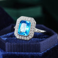Silver Tone Blue Rectangular Stone Double Halo Ring view 3