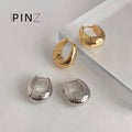 Polished Oval Huggie Hoop Earrings In Gold Silver And Three Sizes view 4
