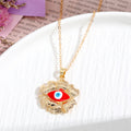 Gold and Silver Tone Crystal Evil Eye Pendant Necklaces in Eight Styles view 9