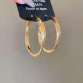 Double Layer Textured Hoop Earrings in Gold with Polished Details view 6