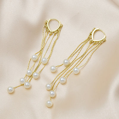 Primary supplied view of pearl-look multi-chain huggie earrings