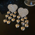 Crystal Heart Tassel Earrings in Polished Statement Design view 6
